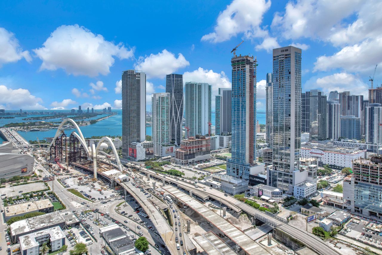 Stunning aerial view of Downtown Miami skyline showcasing skyscrapers and urban development.